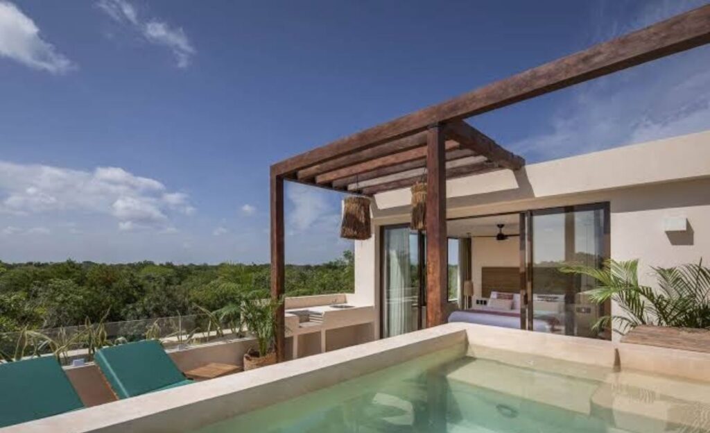 Rooftop room with a private pool and stunning views.
