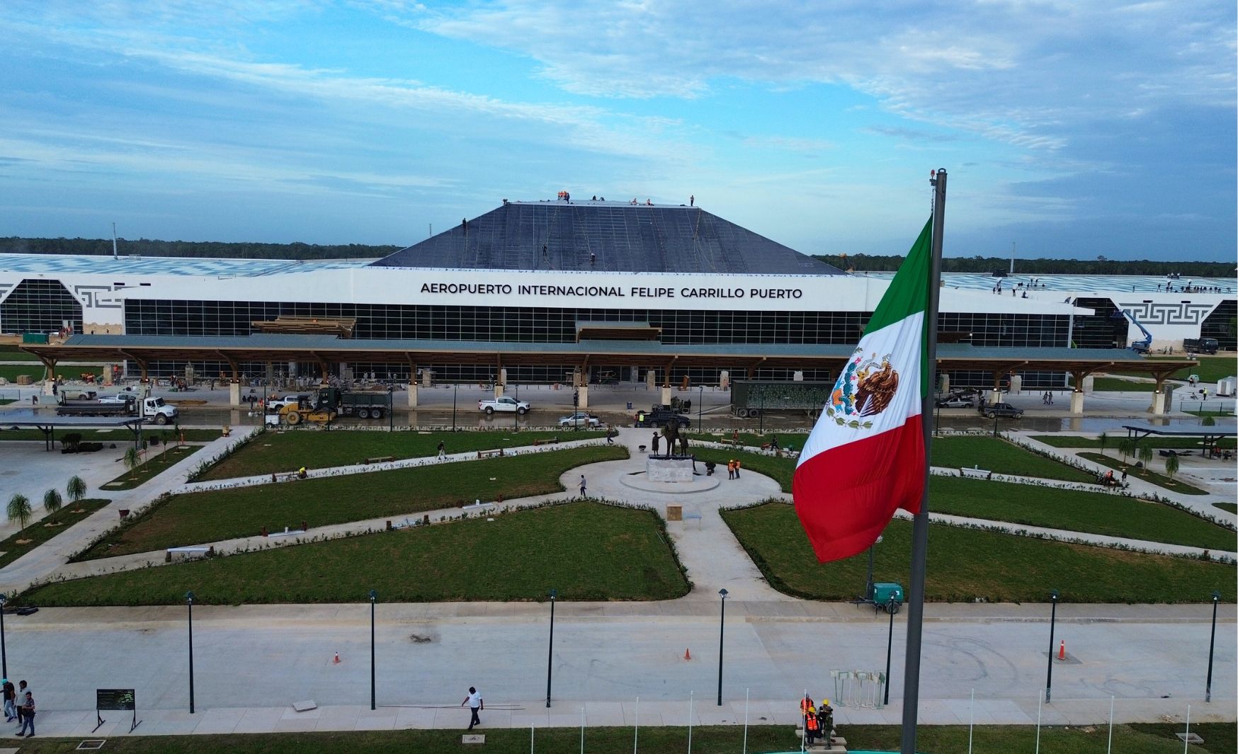 View of Tulum's new airport with the Mexican flag in front.